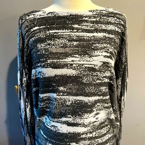 Silver light weight beaded and bling sweater.  Chico size 2